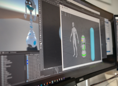 A computer monitor that has several windows open. One window is a simulated robot in a virtual environment. One window has a model editor view of the robot standing next to a gray humanoid figure as a reference.