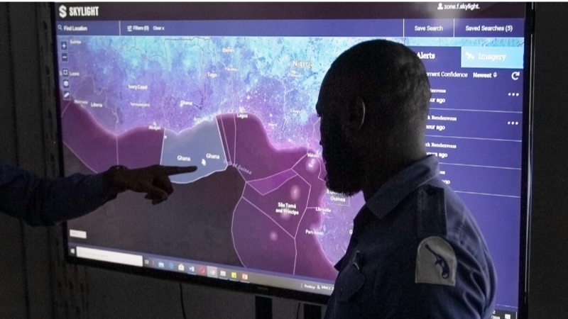A watchkeeper analyzes Skylight rendezvous alerts at an operations center in Accra, Ghana. (MMCC Zone F Photo)